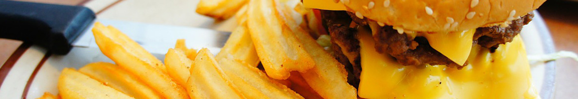 Eating Burger Hot Dog at Marty's Hamburger Stand restaurant in Los Angeles, CA.